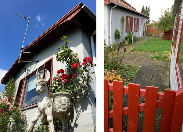 sydgavl med antenne og havelåge ved garage